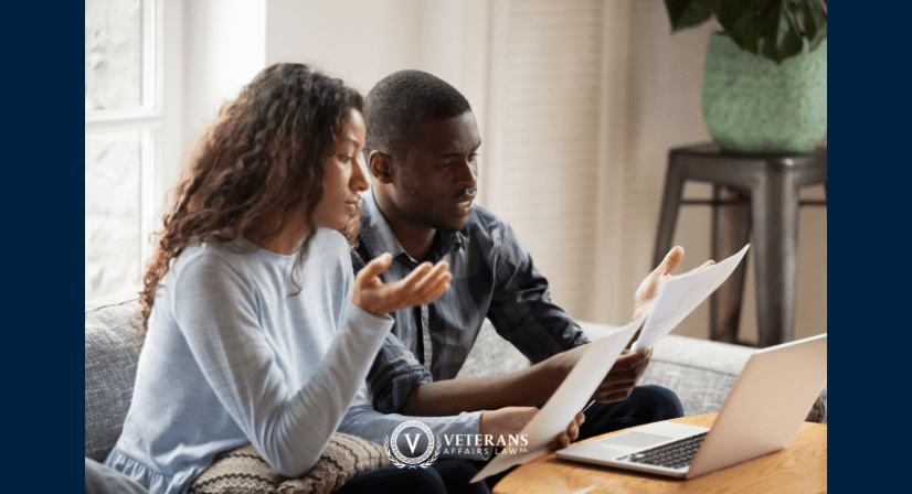 couple looking at va disability paperwork