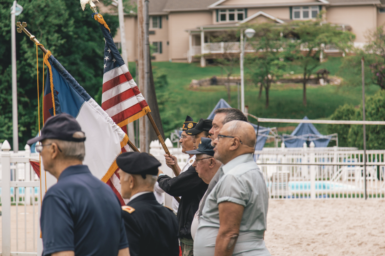 veterans stading with flags in florida