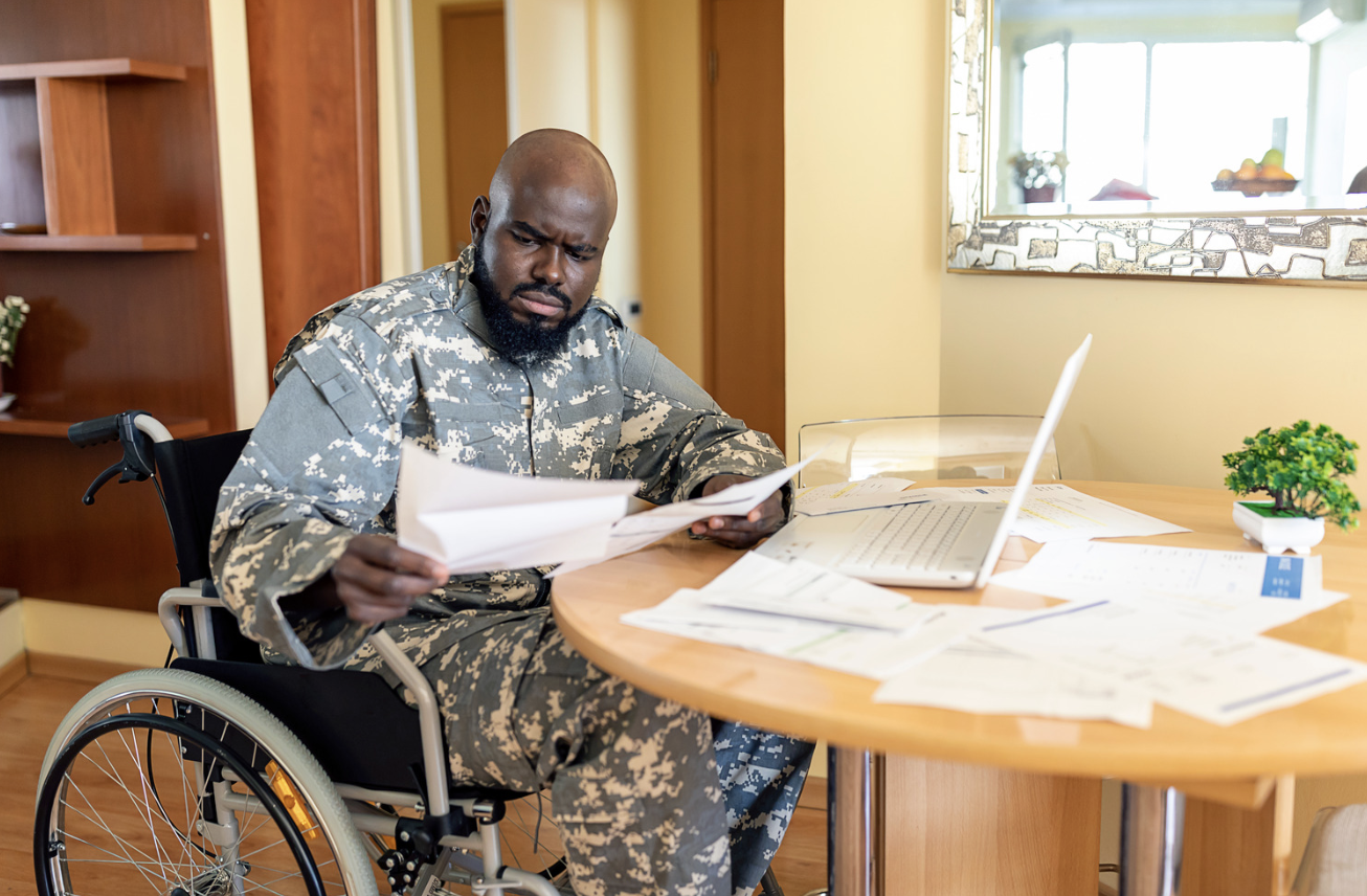 veterans on computer looking at benefits at year end