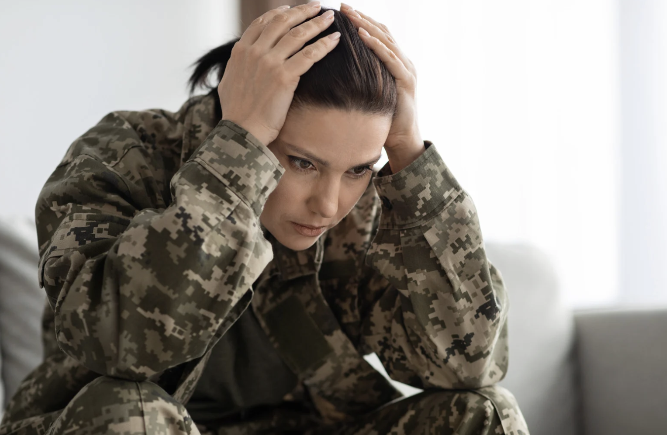 female veteran who appears to be stressed out due to va denial